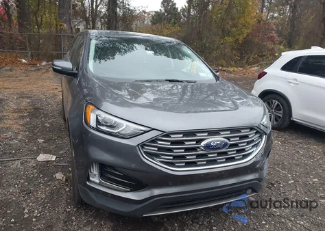 2022 Ford Edge Titanium z USA, uszkodzony, nr VIN 2FMPK4K90NBA35277